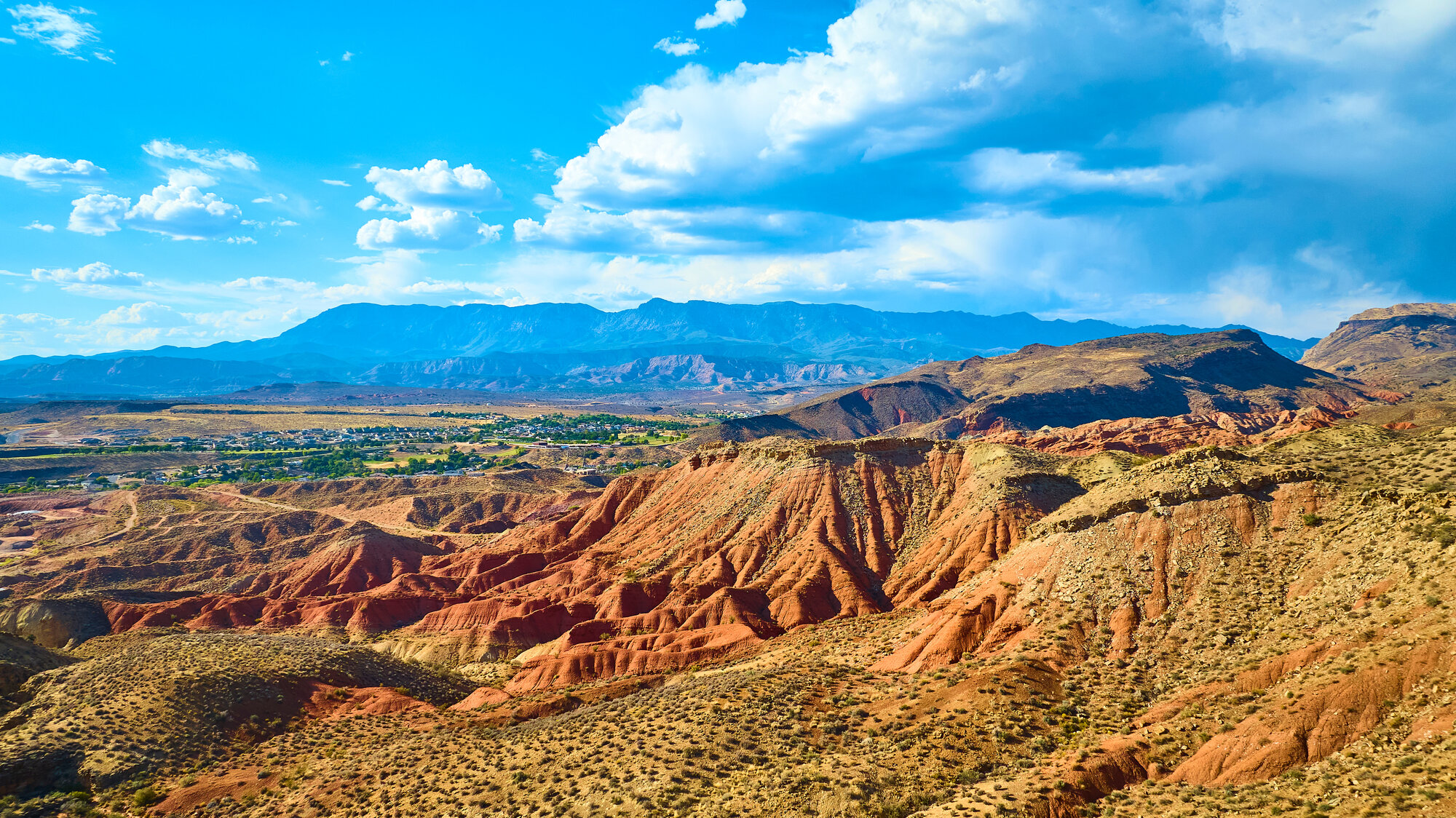 Red rock formations and mountains near Hurricane, Utah at golden hour